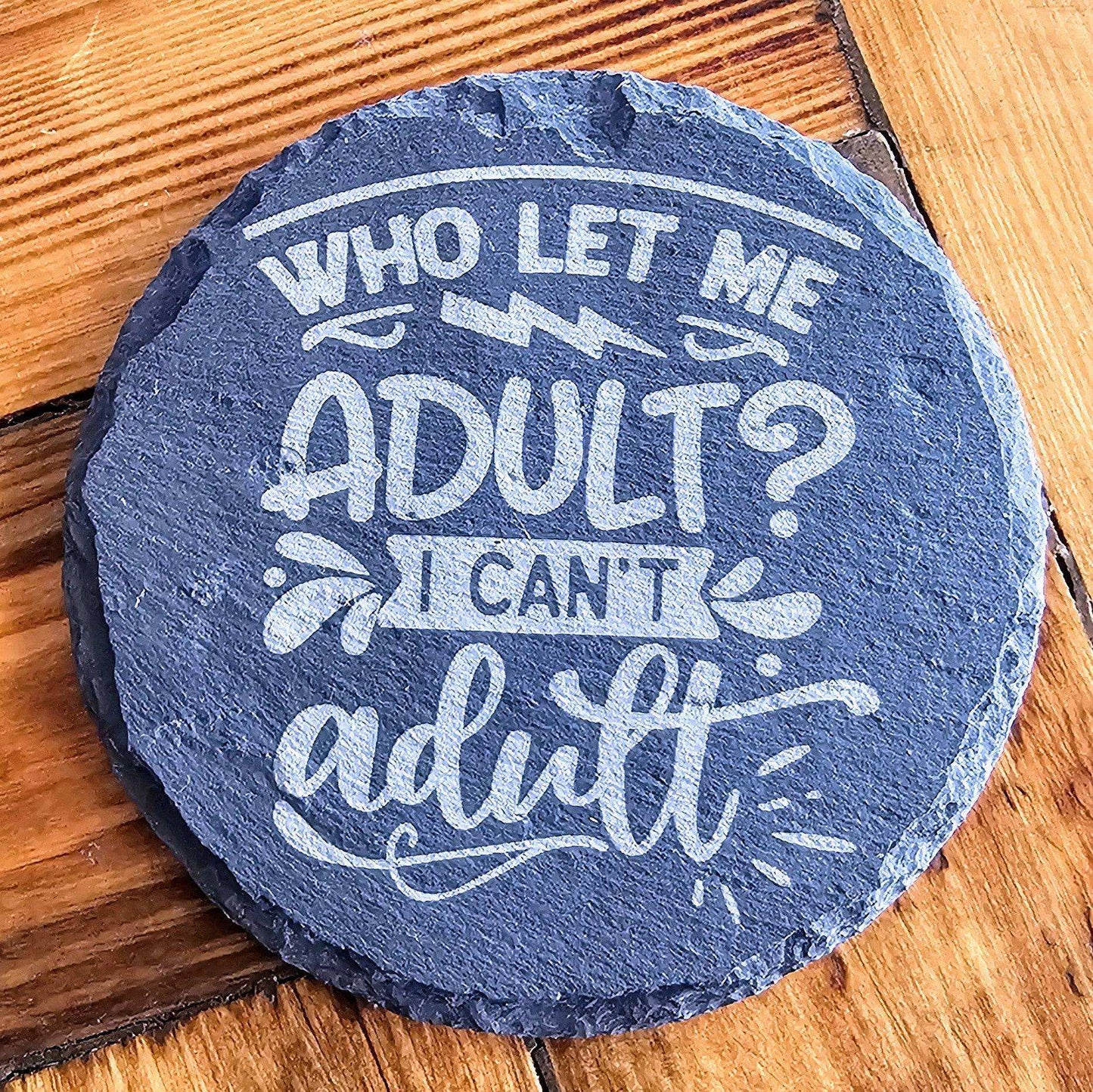 a stone that says, who let me adult? i can't adult