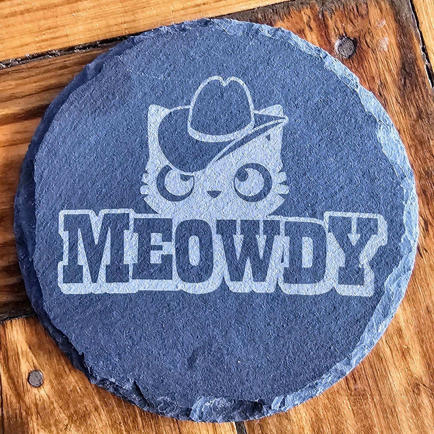 a stone with the word meowly on it